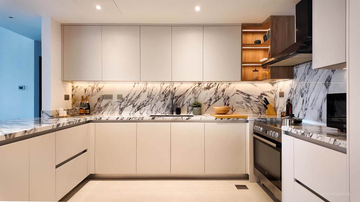 Open-Concept Marble Waterfall Kitchen